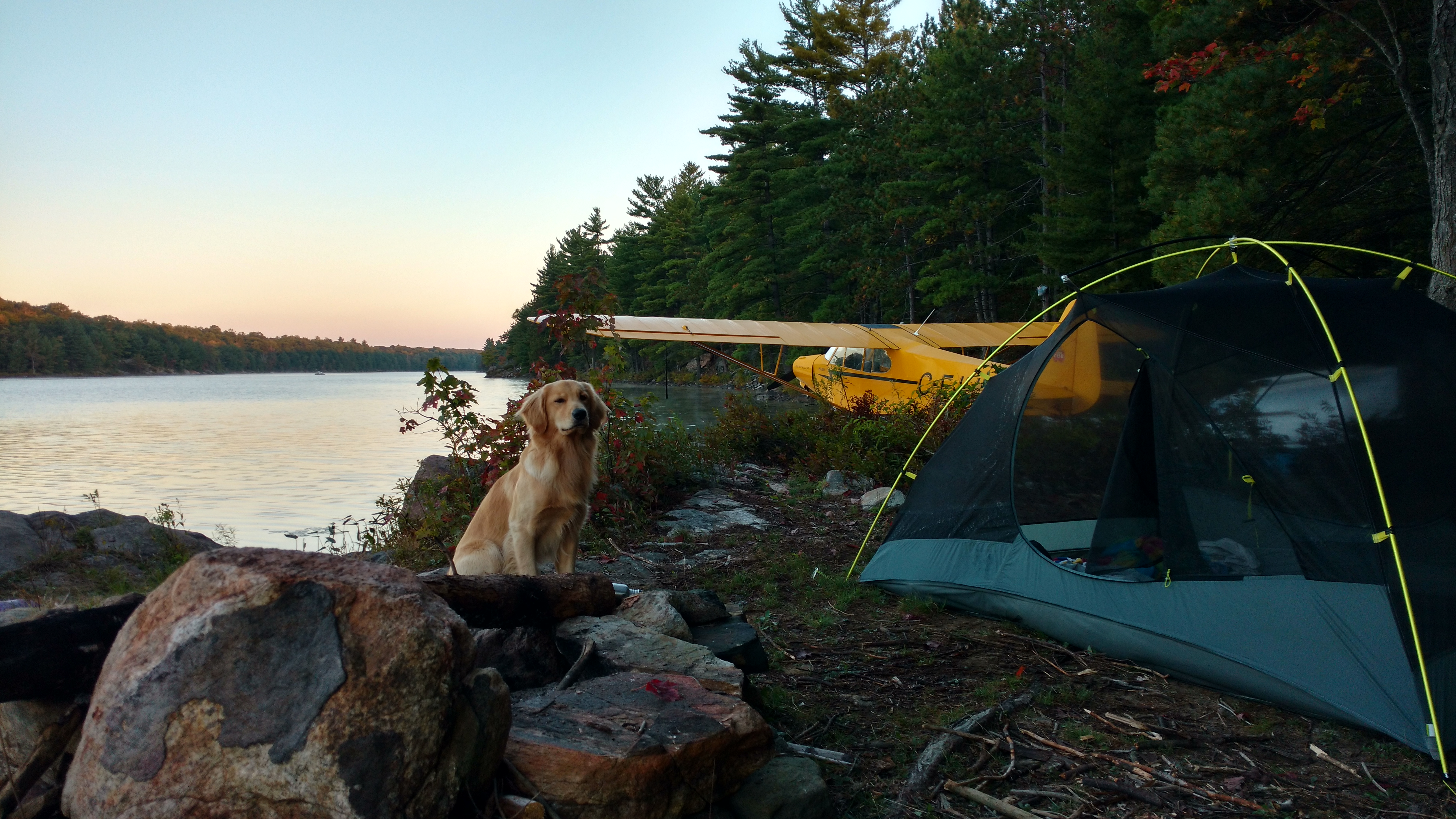 Piper Cub camping on a lake