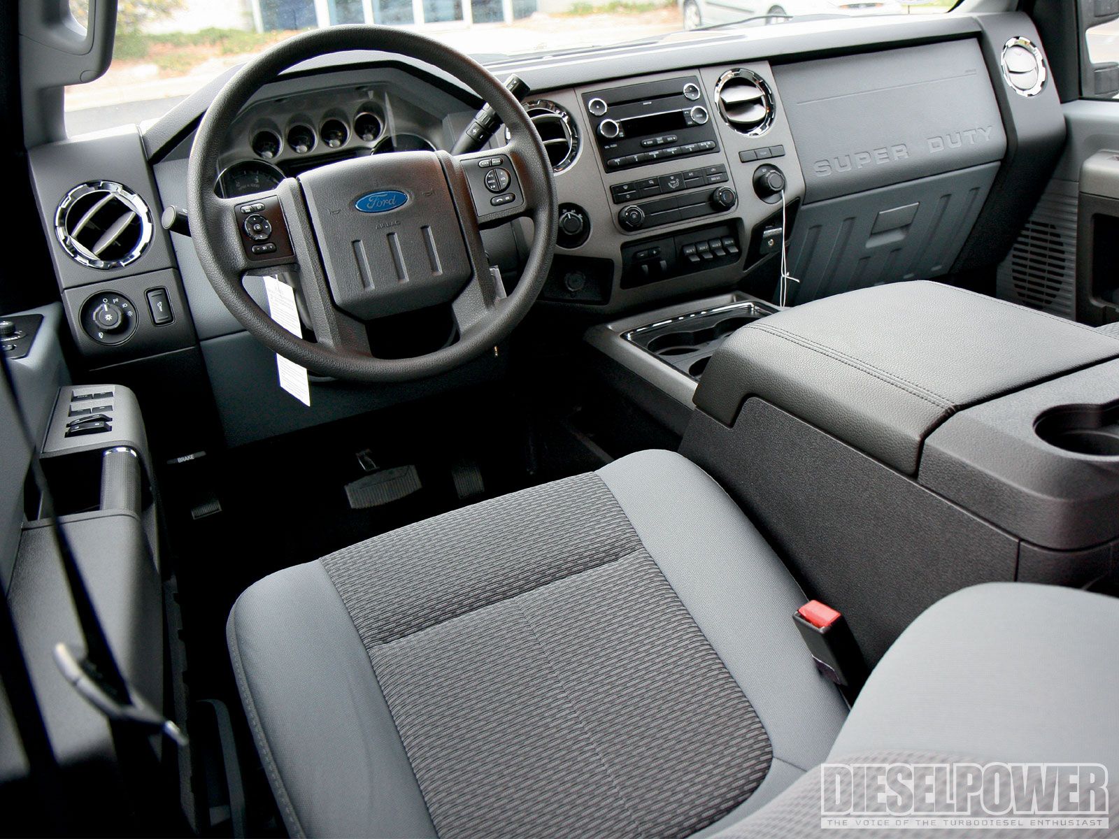 1102dp_07_o+1102dp_king_of_the_hill_silverado_vs_super_duty+ford_super_duty_interior_cabin.jpg