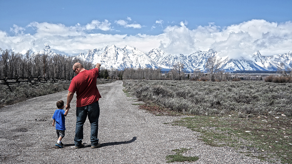 Olin and daddy teton horizon.jpg